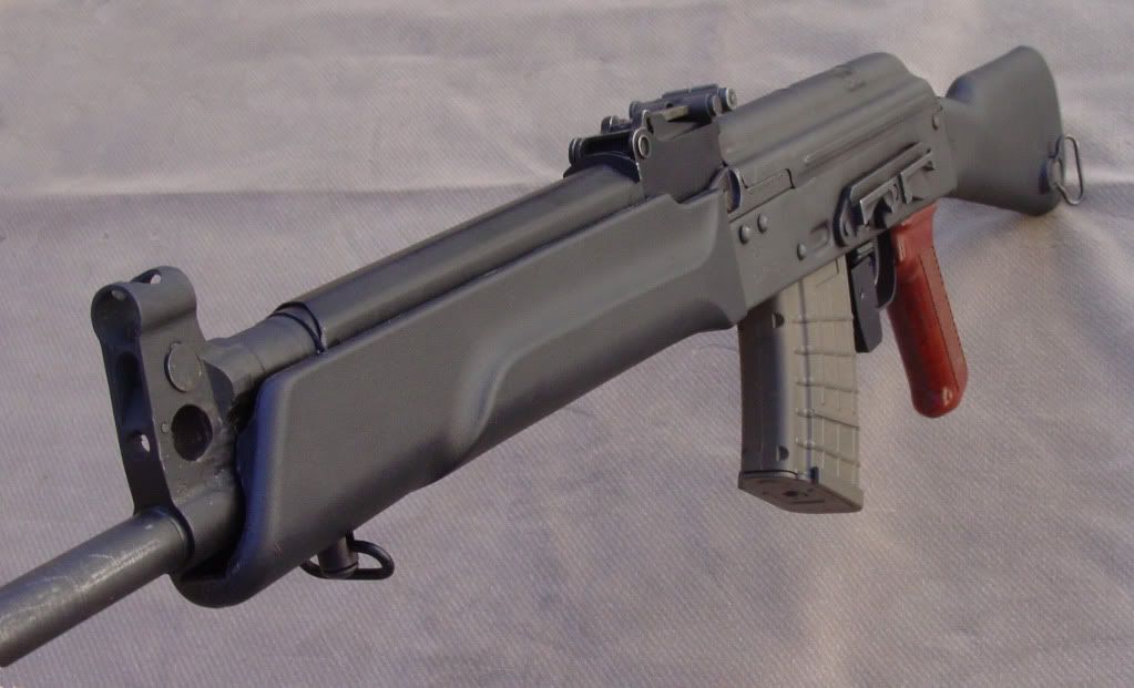 What entails converting Pump Action Rifle AK to semi auto?