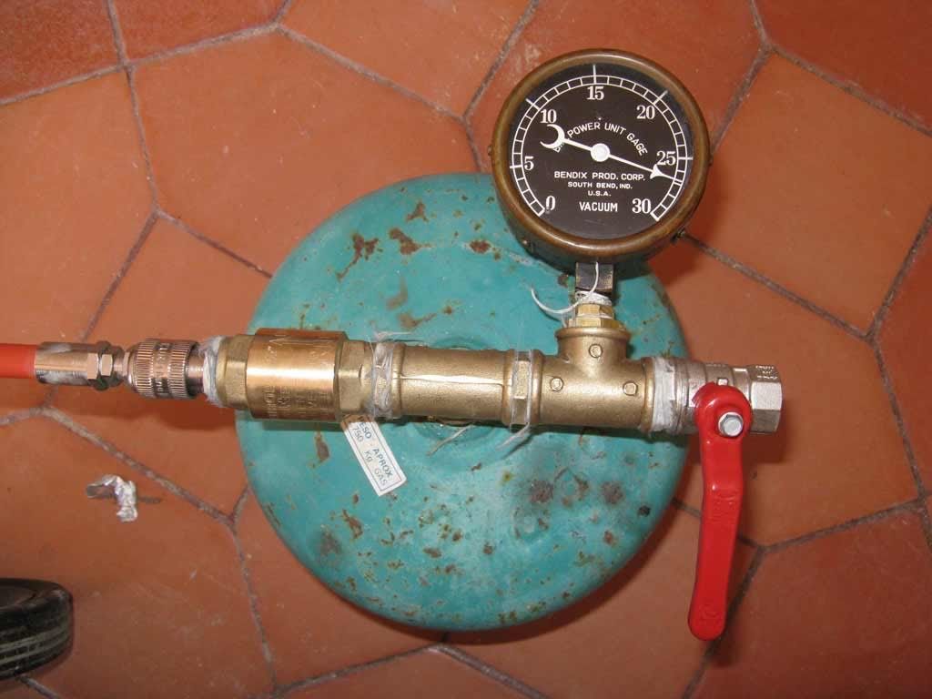 Turning a compressor into a vacuum pump? Compressors