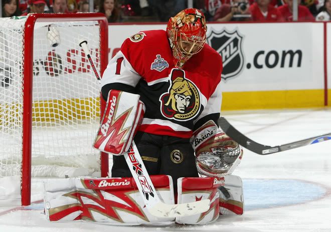 Ray Emery 1 of the Ottawa Senators makes a pad save in the first